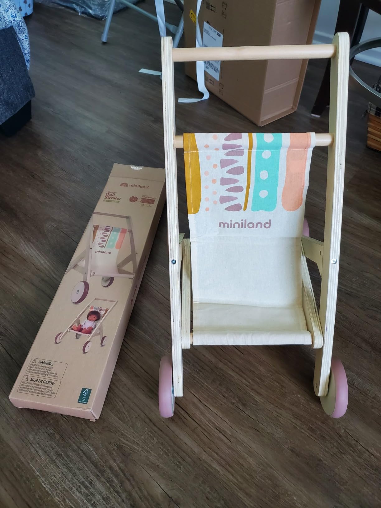 Miniland Dolls carrello bambole in legno FSC da 1-8 anni